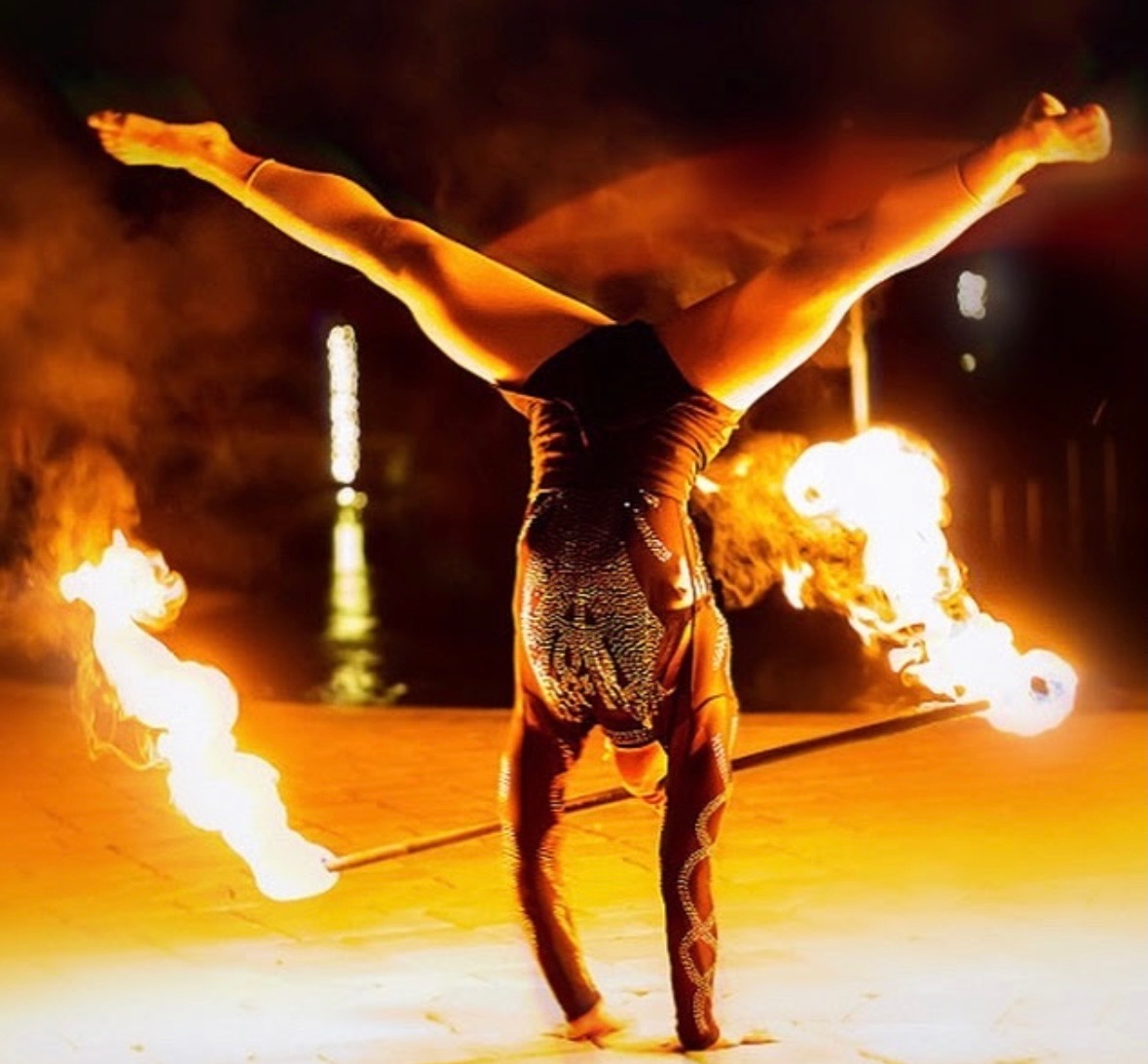 Handstand splits with fire