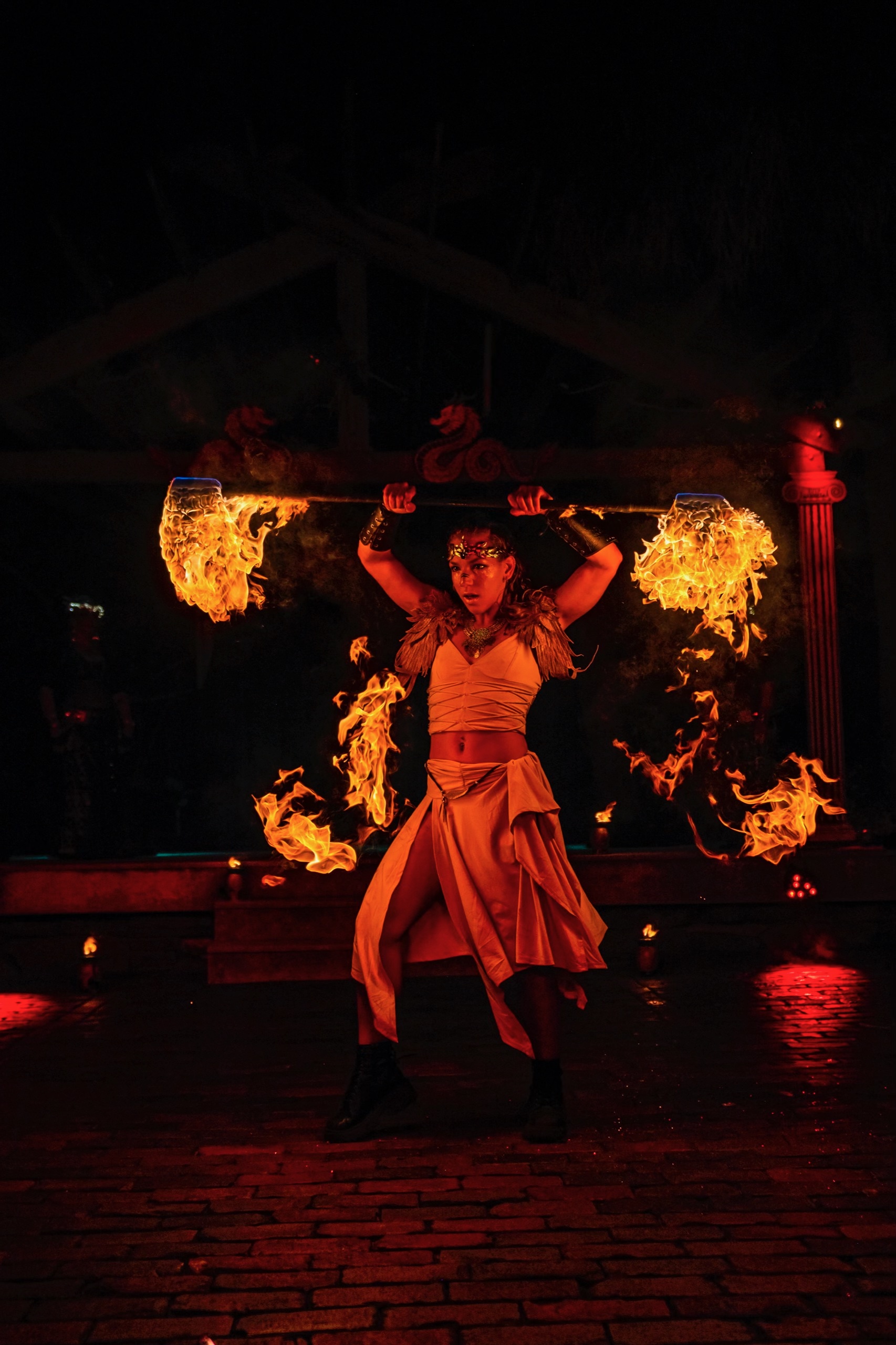 Theatrical fire staff performance